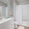 shower/tub combo in bright bathroom